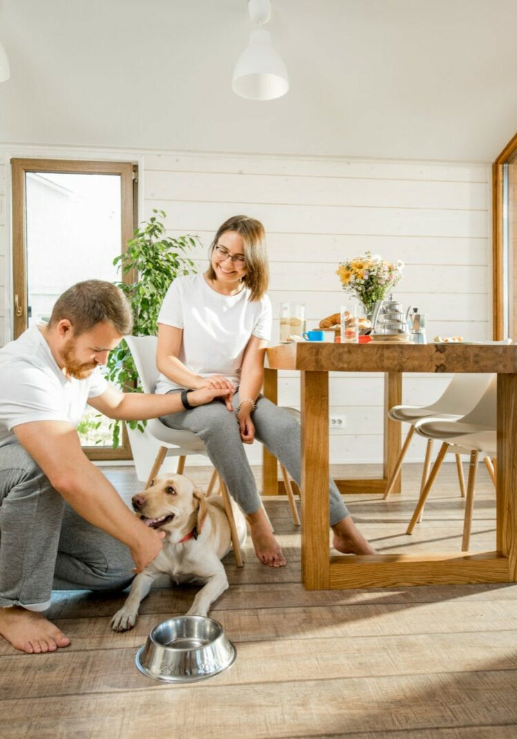 Young couple with dog at home | Floor to Ceiling Marshall